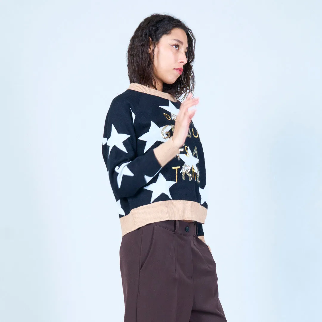 Star print sweater with playful text wholesale